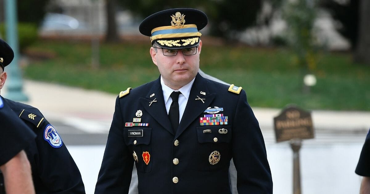Army Lt. Col. Alexander Vindman, the National Security Council's top Ukraine expert, arrives Tuesday for a closed-door deposition at the U.S. Capitol in Washington.