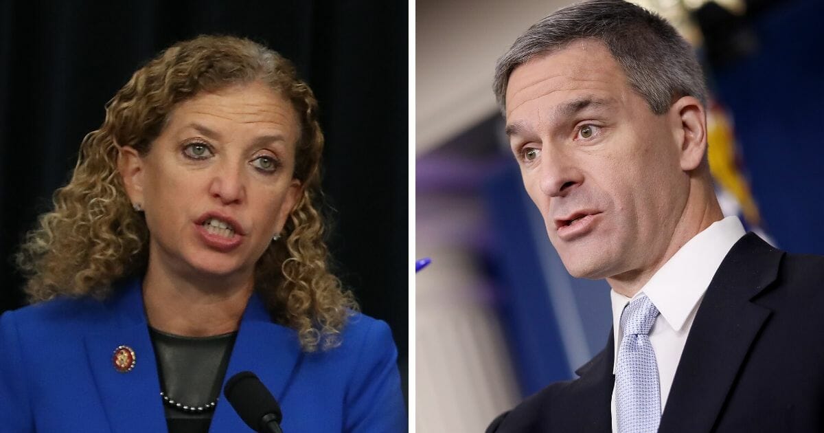 Democratic Rep. Debbie Wasserman Schultz, left, and Ken Cuccinelli, acting director of Citizenship and Immigration Services, right.