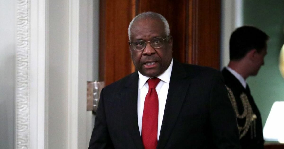 Supreme Court Justice Clarence Thomas arrives for the ceremonial swearing-in of Justice Brett Kavanaugh in the East Room of the White House on Oct. 8, 2018, in Washington, D.C.