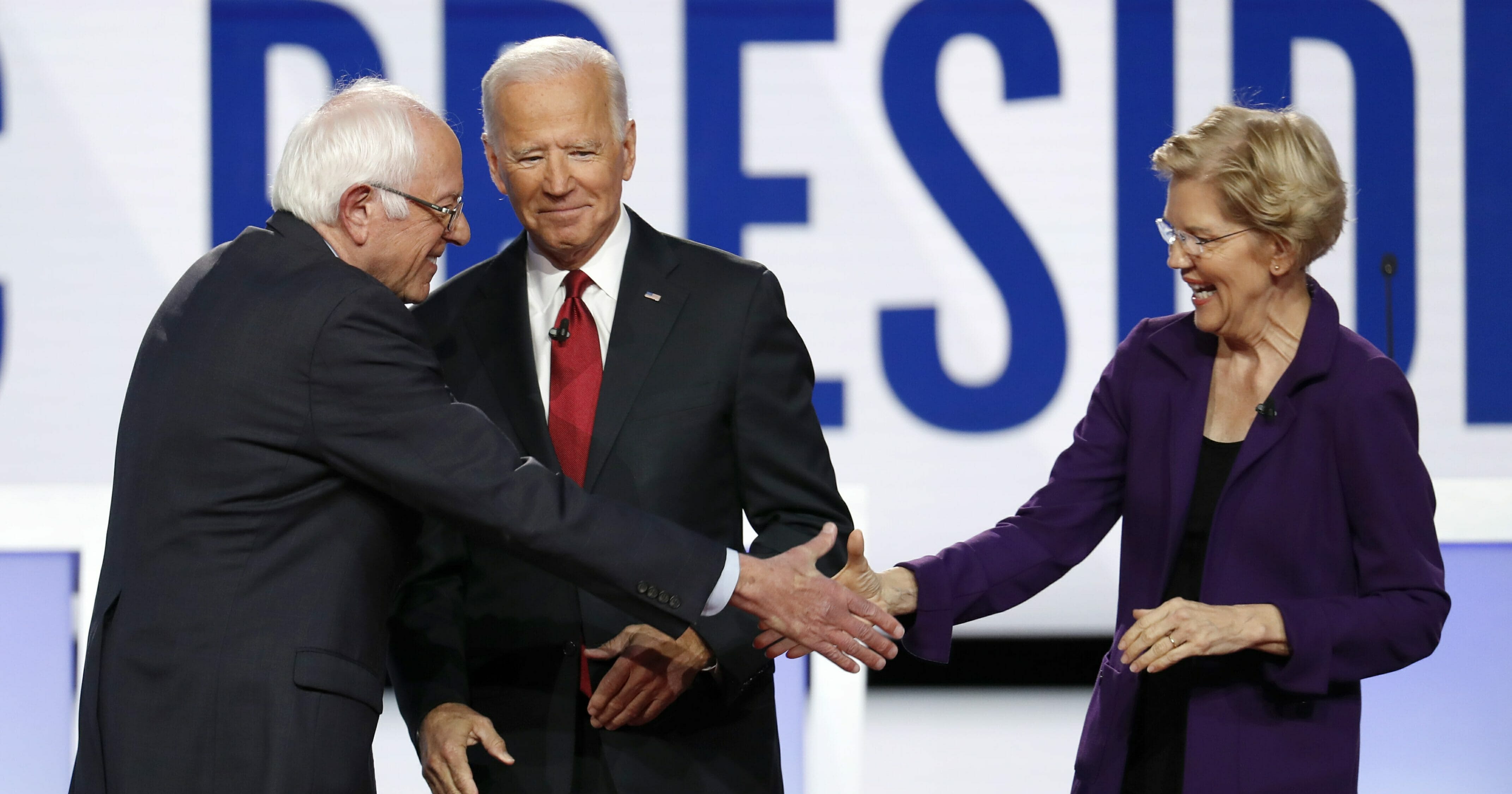 Democratic presidential candidate Sen. Bernie Sanders, I-Vt., left, former Vice President Joe Biden and Sen. Elizabeth Warren, D-Mass., right, participate in a Democratic presidential primary debate hosted by CNN/New York Times at Otterbein University, Tuesday, Oct. 15, 2019, in Westerville, Ohio.