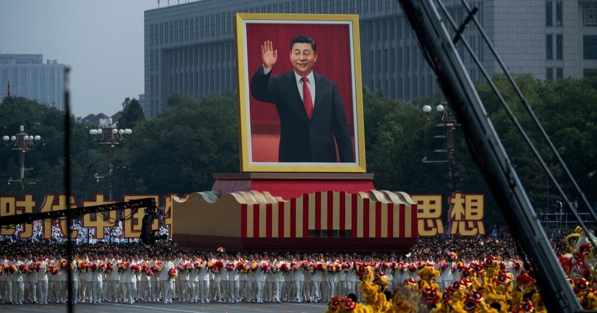 A giant portrait of Chinese President Xi Jinping is carried atop a float at a parade to celebrate the 70th Anniversary of the founding of the People's Republic of China in 1949 , at Tiananmen Square on Oct. 1, 2019 in Beijing, China.