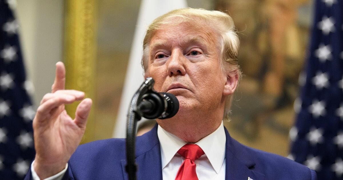 President Donald Trump gestures during a White House news conference on Monday.