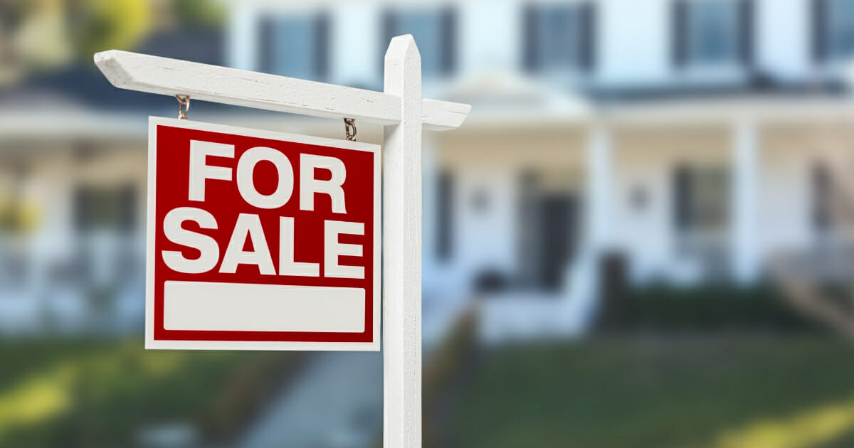 A Utah man allegedly decided to move into a vacant home anyway after the owner of the property refused to accept his low-ball offer. The image above is a stock photo of a for-sale sign.