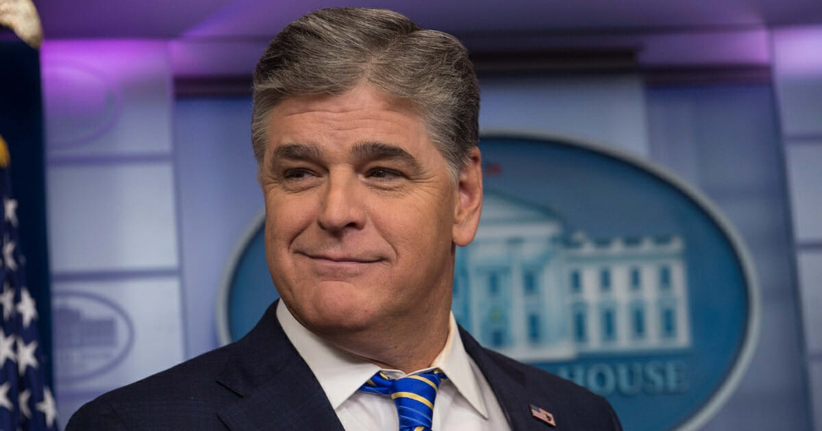 Fox News host Sean Hannity is seen in the White House briefing room.