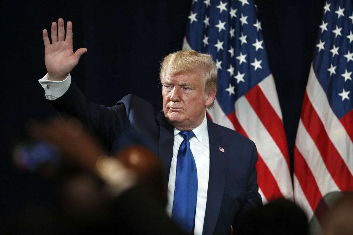 President Donald Trump waves to supporters after speaking at a rally to launch Black Voices for Trump Friday, Nov. 8, 2019, in Atlanta.