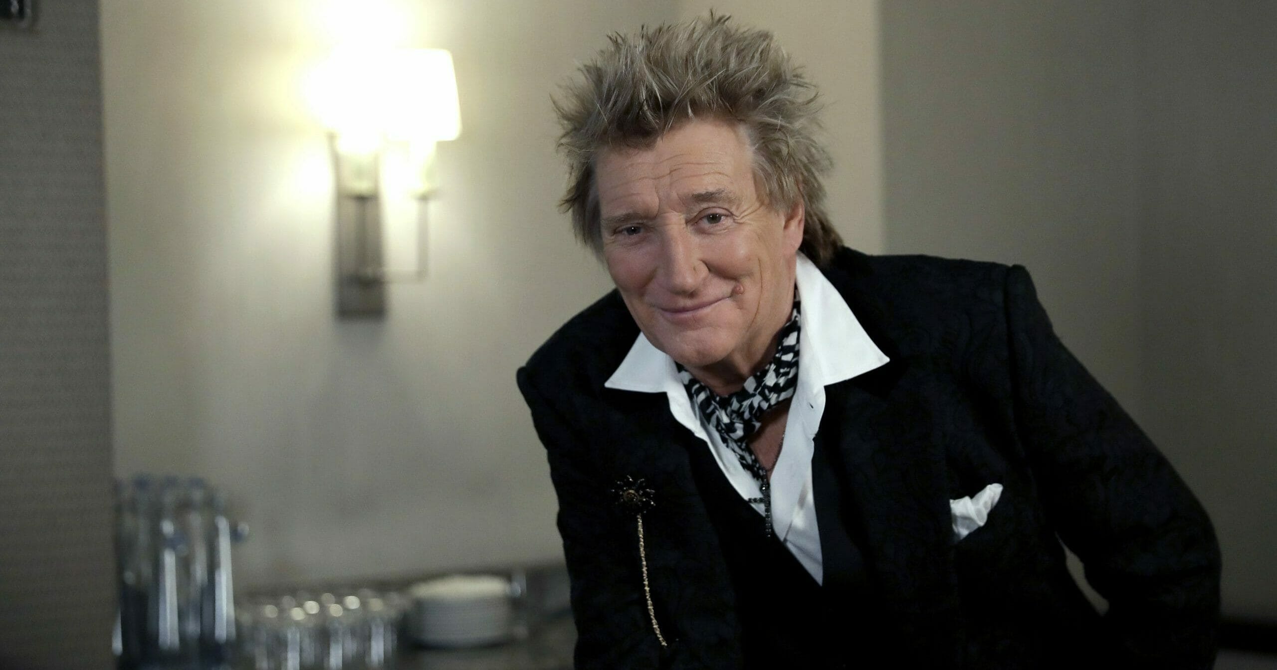 In this photo taken on Nov. 14, 2019, British singer Rod Stewart poses for the media after an interview with The Associated Press at a hotel in London. Stewart, known for decades as a consummate crooner, rocker, fashion plate and tongue-in-cheek sex symbol, is adding a new element to his image: serious model railroad builder. The one-time front man of The Faces who has hits dating back to the 1960s, has put the finishing touch on a 23-year project that has landed him on the cover of Railway Modeller magazine, a far cry from Rolling Stone, whose cover he has graced many times.