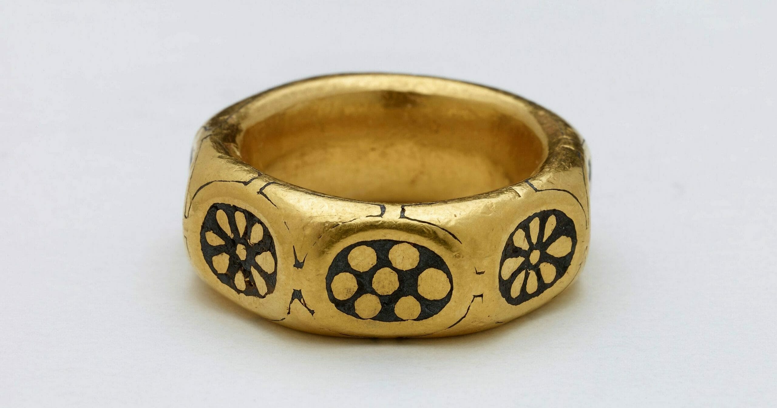 This undated handout photo provided by the British Museum shows a gold ring from the ninth century which was part of a £3 million Viking hoard, metal detectorists George Powell and Layton Davies have been convicted of stealing.