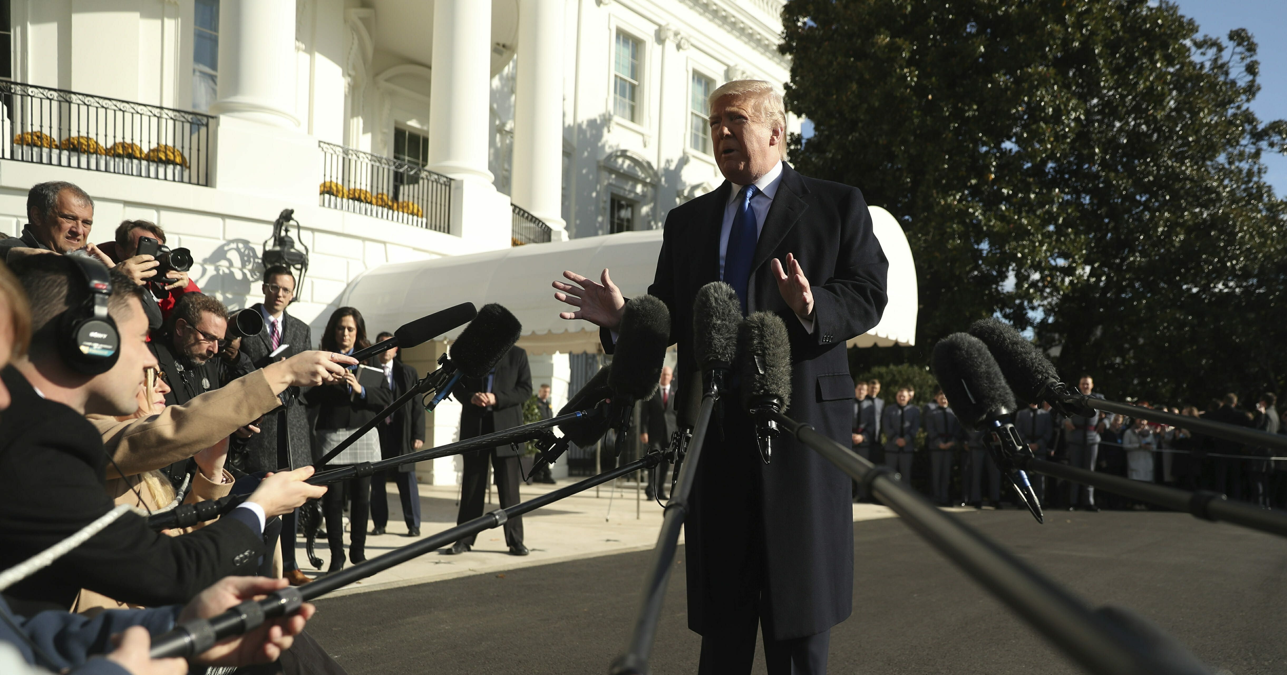 President Donald Trump speaks to reporters on the South Lawn of the White House in Washington on Nov. 8, 2019.