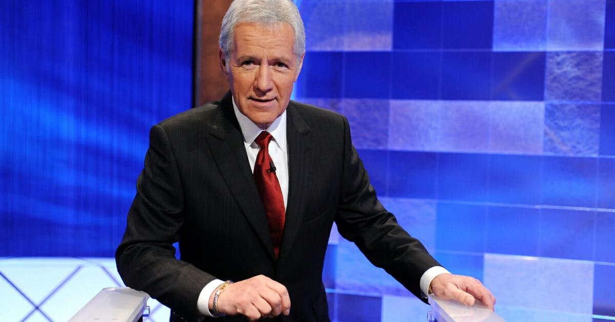 Game show host Alex Trebek poses on the set of the "Jeopardy!" Million Dollar Celebrity Invitational Tournament Show Taping on April 17, 2010, in Culver City, California.