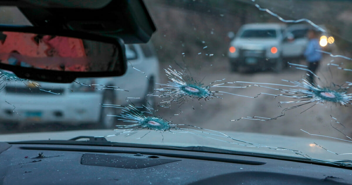 Bullet holes are seen in the windshield of the car where members of the LeBaron family were killed during an ambush in Mexico's Sonora mountains on Nov. 5, 2019.