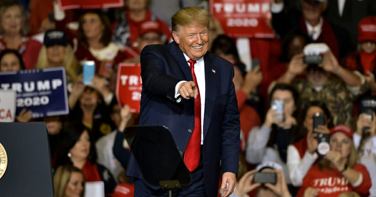 President Donald Trump points toward the crowd during a "Keep America Great" campaign rally at BancorpSouth Arena on Nov. 1, 2019, in Tupelo, Mississippi.