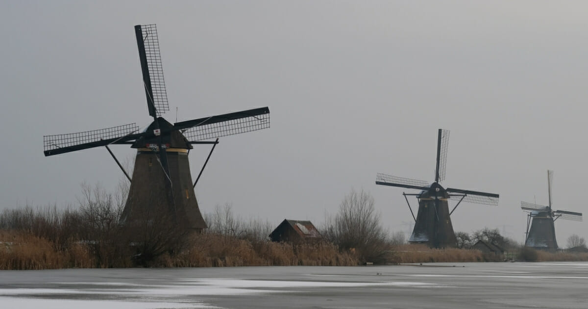 UNESCO World Heritage Kinderdijk windmills stand as snow covers frozen waters in Kinderdijk, near Rotterdam, in the Netherlands on Jan. 24, 2019.