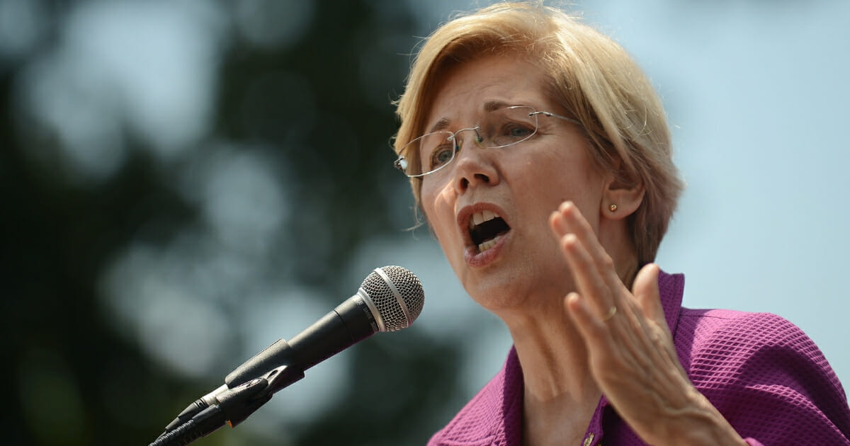 Sen. Elizabeth Warren (D-Massachusetts) speaks at a rally to oppose the repeal of the Affordable Care Act and its replacement on Capitol Hill on June 21, 2017, in Washington, D.C.
