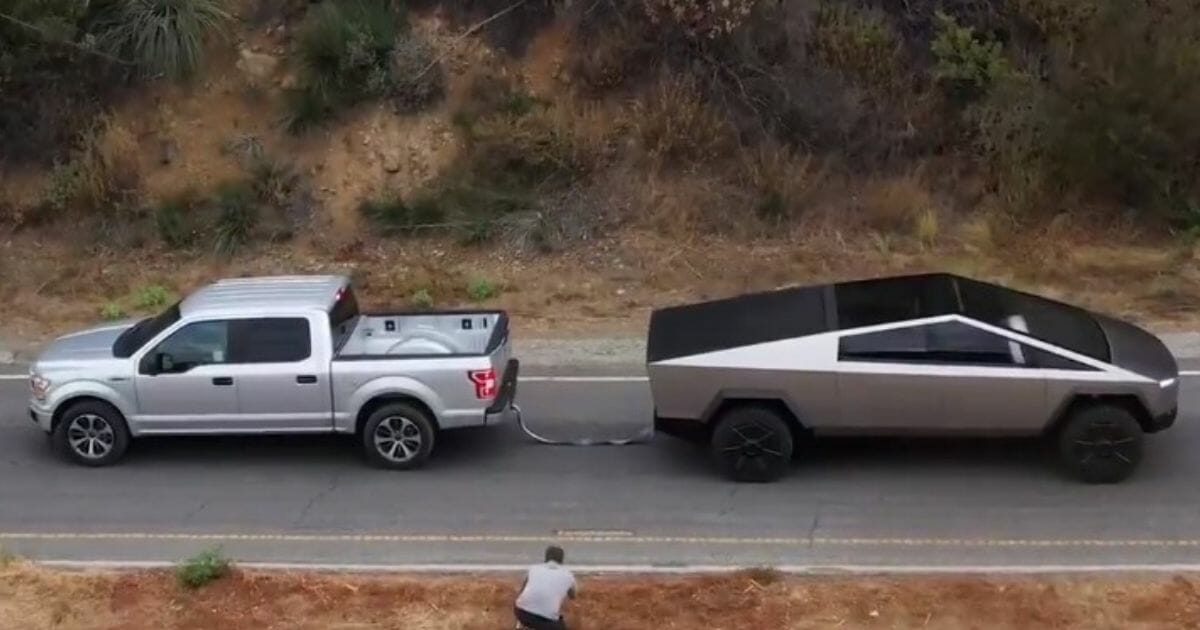 Tesla pulling a Ford truck