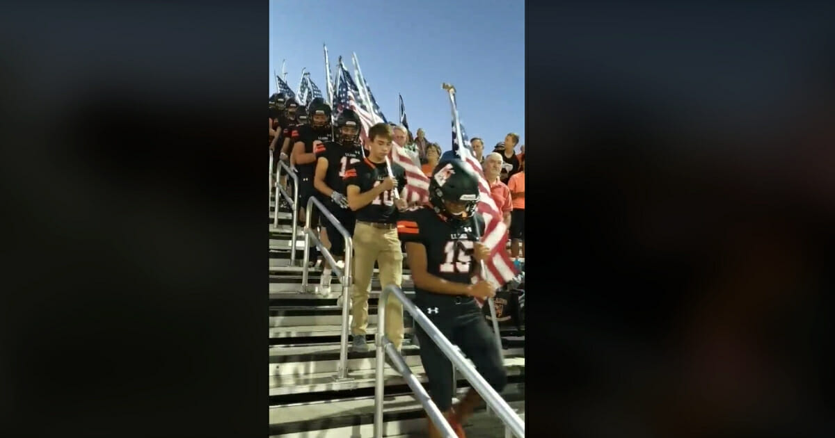 A high school football team in Texas is receiving praise for an exceptional display of patriotism.