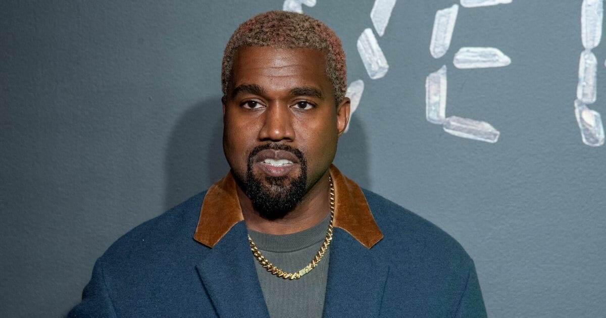 Kanye West attends the the Versace fall 2019 fashion show at the American Stock Exchange Building in lower Manhattan on Dec. 2, 2018, in New York City.