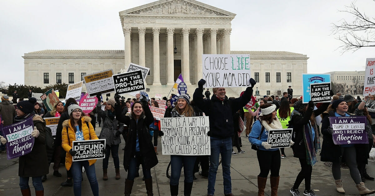 Pro-life protesters gather in front of the Supreme Court building during the March for Life on Jan. 18, 2019, in Washington, D.C.