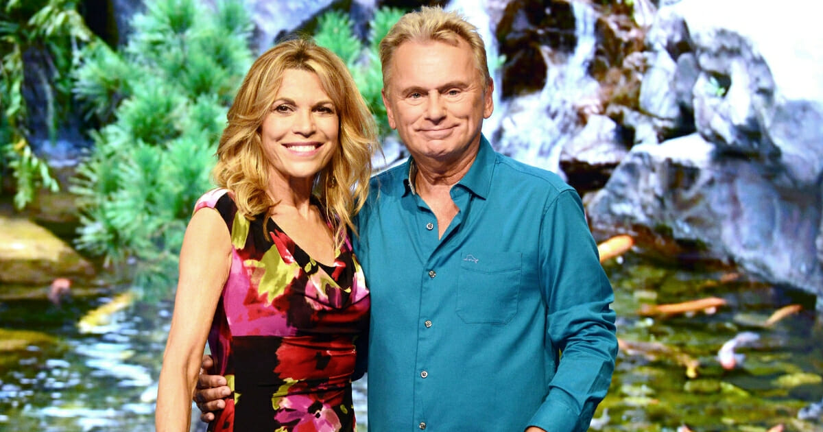 "Wheel of Fortune" hosts Vanna White, left, and Pat Sajak attend a taping at Walt Disney World on Oct. 10, 2017, in Orlando, Florida.