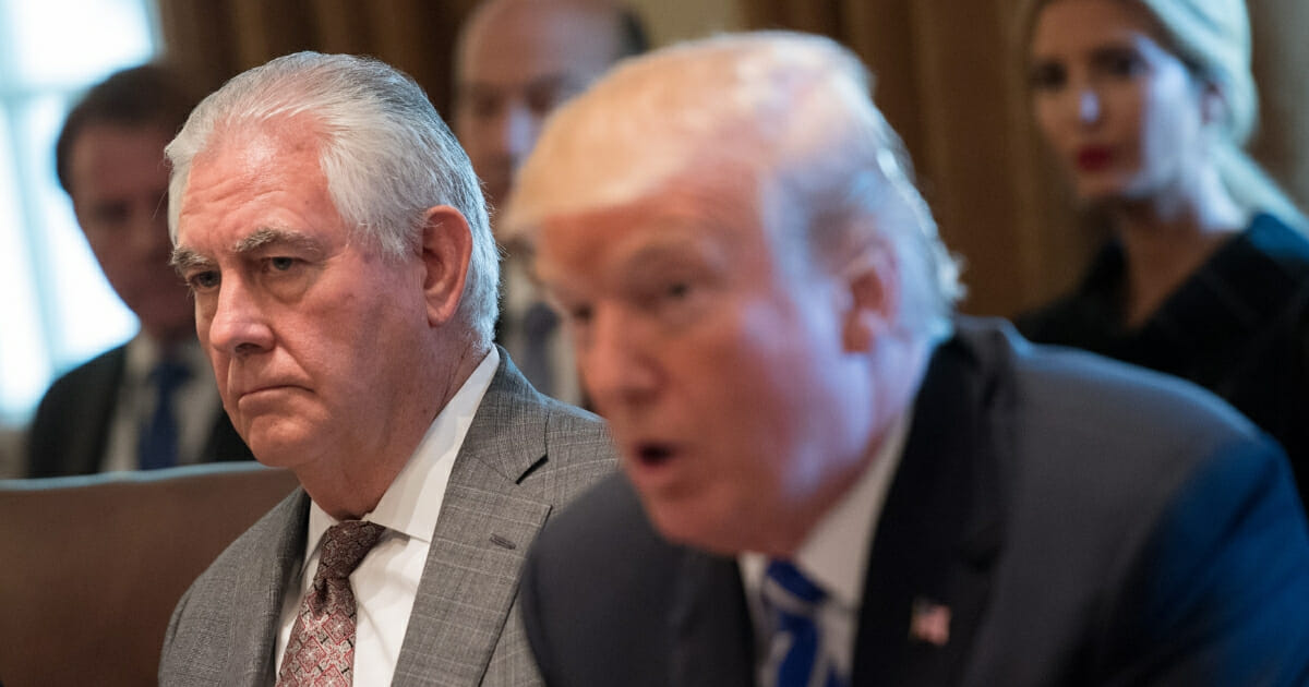 Then-Secretary of State Rex Tillerson listens as President Donald Trump speaks to the media during a Cabinet meeting at the White House on Nov. 20, 2017, in Washington, D.C.