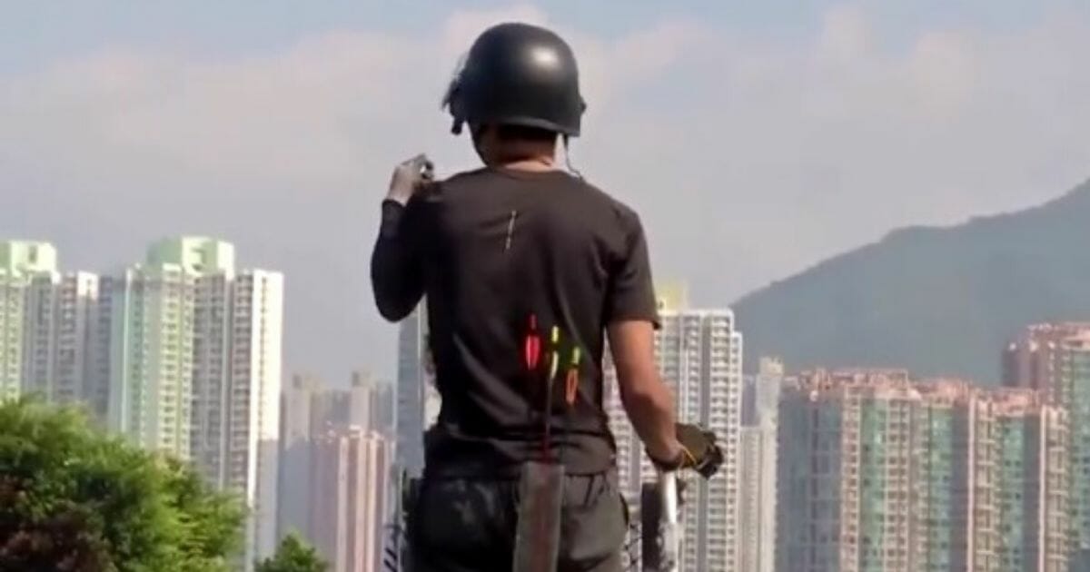 A Hong Kong protester armed with bow and arrows.