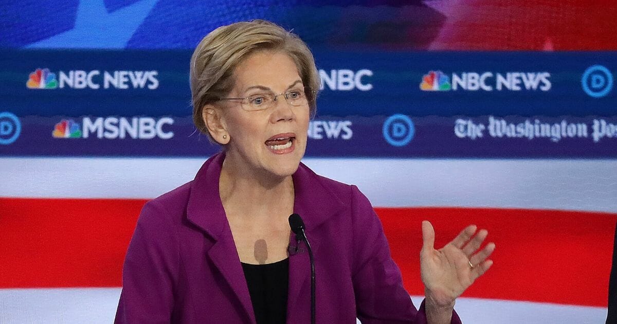 Sen. Elizabeth Warren speaks during the Democratic presidential primary debate on Nov. 20, 2019, in Atlanta. On Nov. 21, Warren used a Twitter post to hype an a reported meeting between President Donald Trump and Facebook CEO Mark Zuckerberg as "corruption, plain and simple."