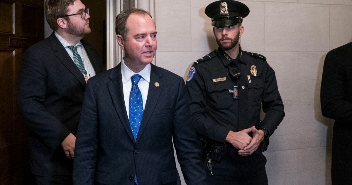 House Intelligence Committee Chairman Adam Schiff  leaves the Longworth House Office Building on Capitol Hill on Wednesday.