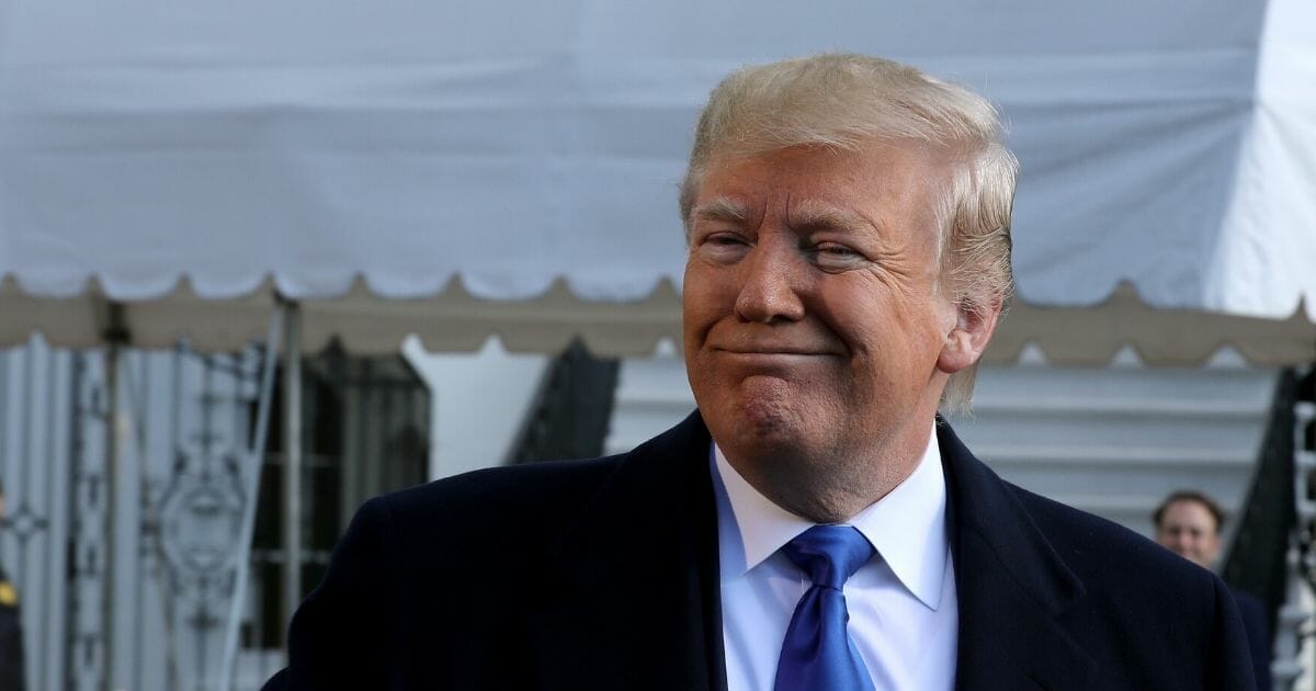 President Donald Trump talks to reporters before boarding Marine One and departing the White House on Nov. 8, 2019, in Washington, D.C.