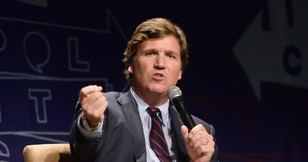 Fox News host Tucker Carlson speaks during Politicon 2018 at the Los Angeles Convention Center on Oct. 21, 2018 in Los Angeles.