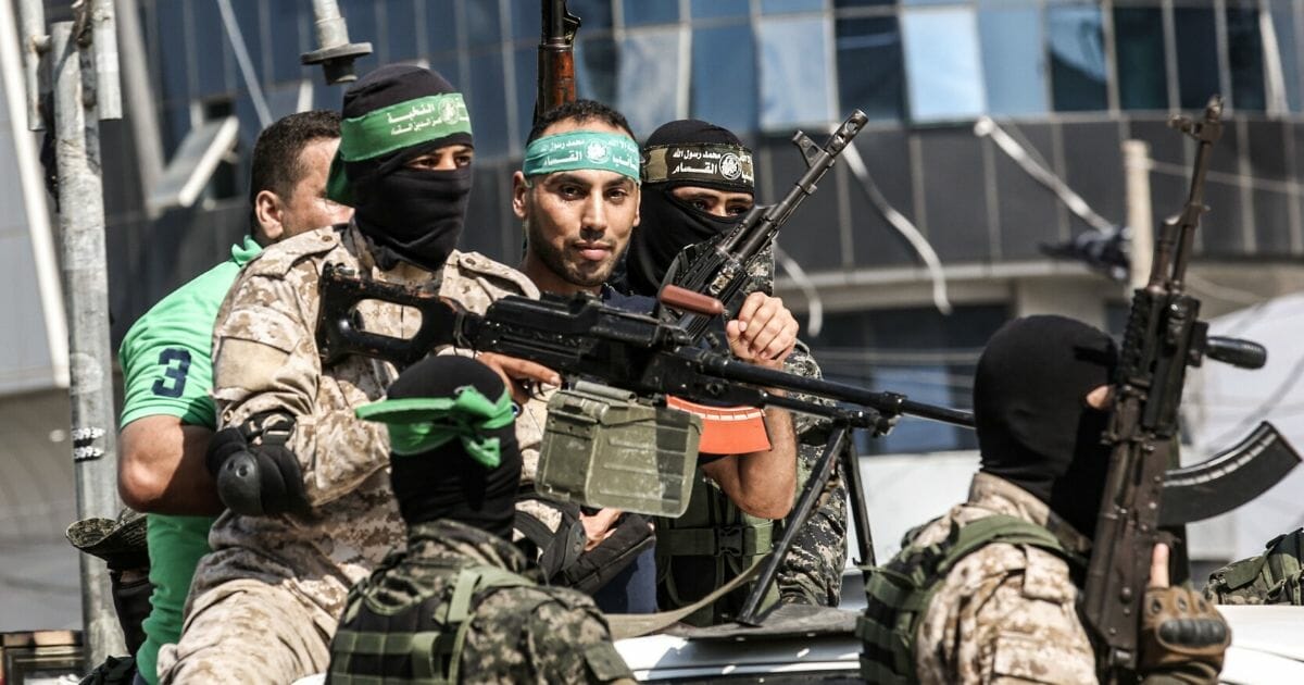 Hamas militants ride in a pickup truck in Rafah in the southern Gaza Strip on Oct. 17, 2019.