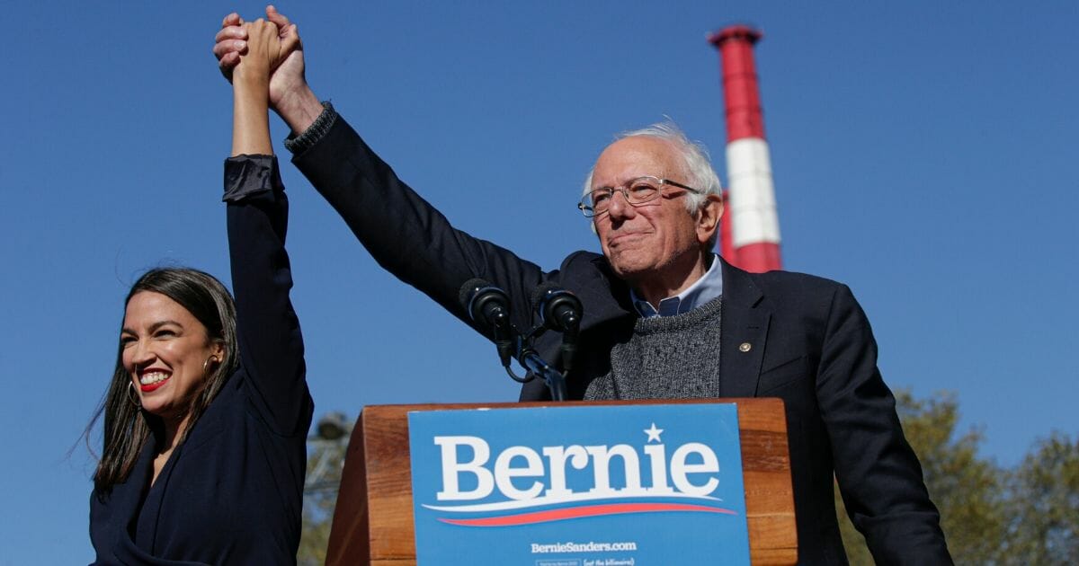 Rep. Alexandria Ocasio-Cortez endorses Democratic presidential candidate, Sen. Bernie Sanders at a campaign rally in Queensbridge Park on Oct. 19, 2019.