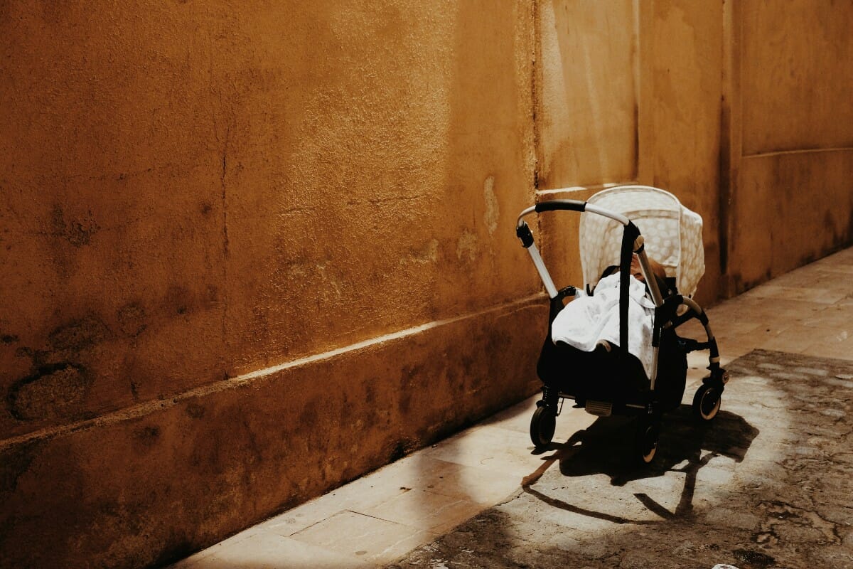 Baby in carriage.