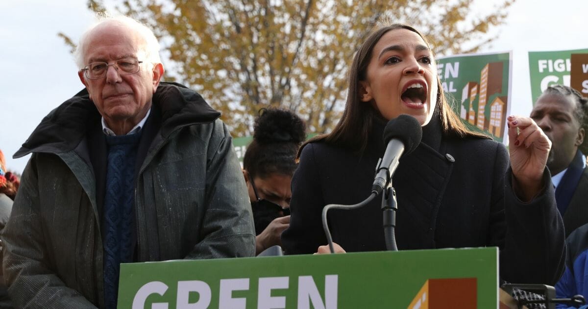 Democratic presidential candidate Sen. Bernie Sanders and Rep. Alexandria Ocasio-Cortez hold a news conference to introduce legislation to transform public housing as part of their Green New Deal proposal outside the U.S. Capitol Nov. 14, 2019 in Washington, D.C.