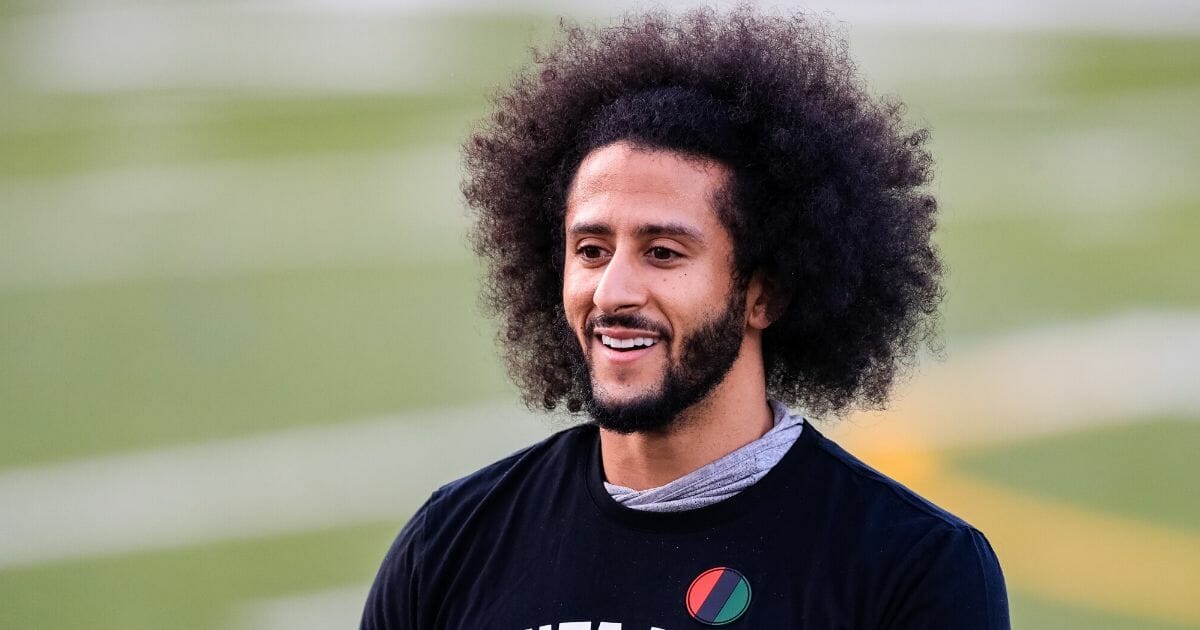 Colin Kaepernick looks on during his NFL workout Nov. 16, 2019, at Charles R. Drew High School in Riverdale, Georgia.