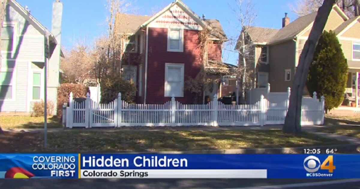 The exterior of a Colorado Springs daycare where police found 26 children hidden in a basement.