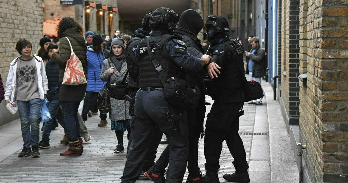 Police apprehend a man