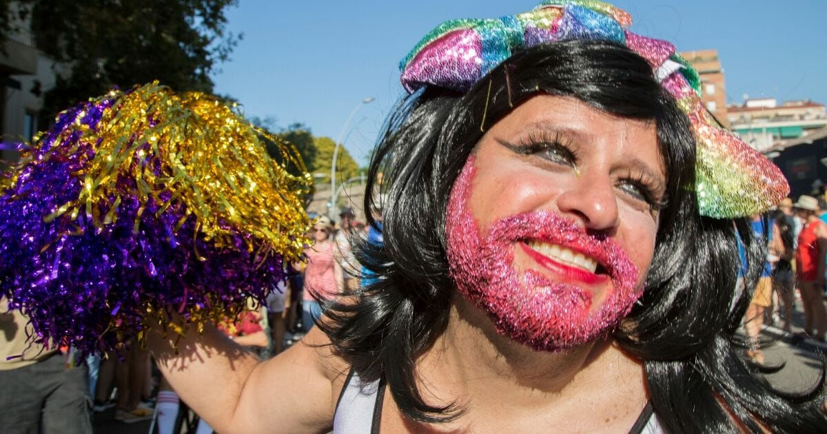 Man in gay pride parade.