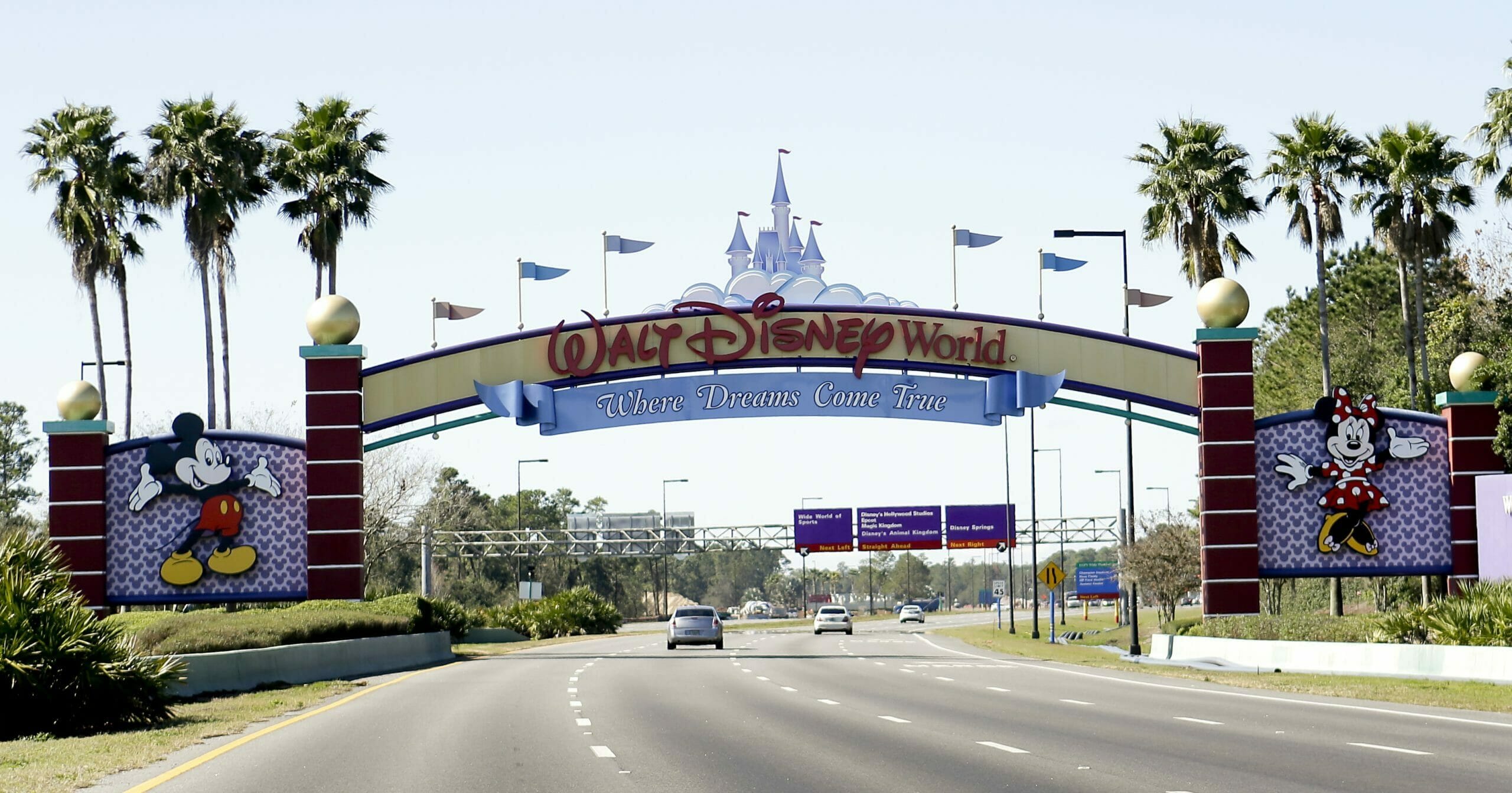 In this Jan. 31, 2017, file photo, cars travel one of the roads leading to Walt Disney World in Lake Buena Vista, Florida.