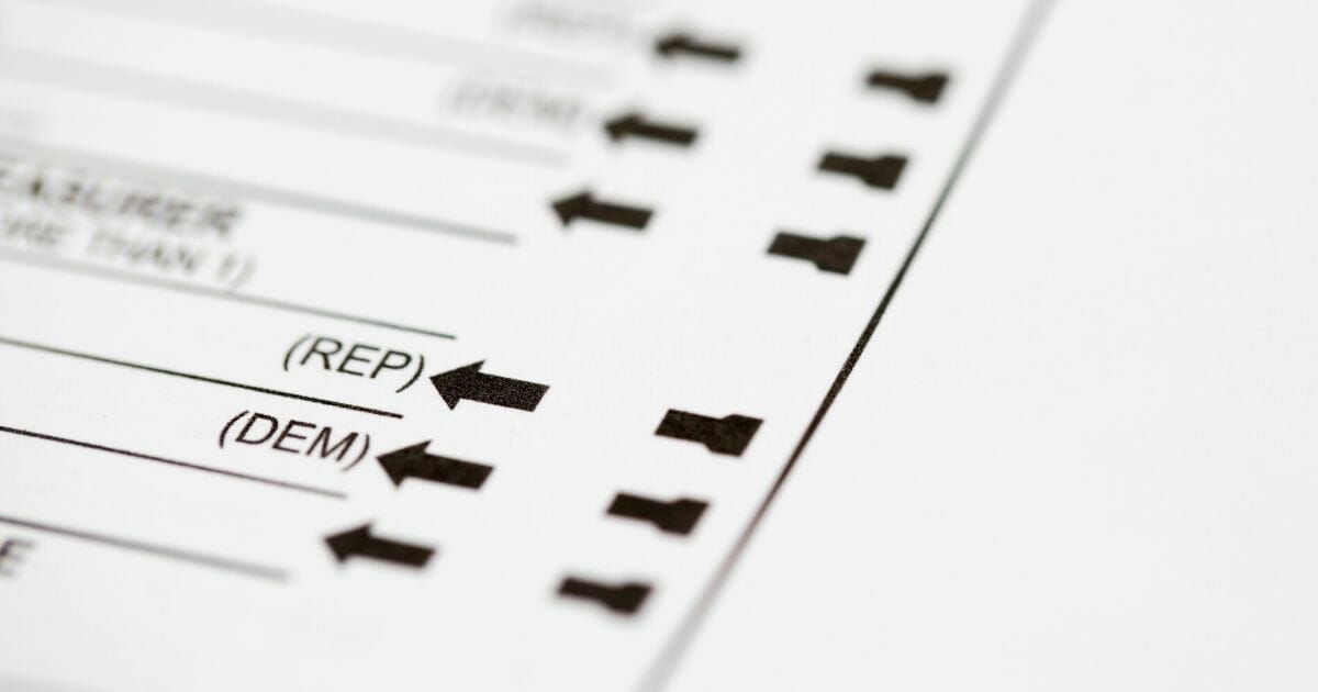 Selective focus on a closeup photo of Republican or Democratic choices on a voting ballot.