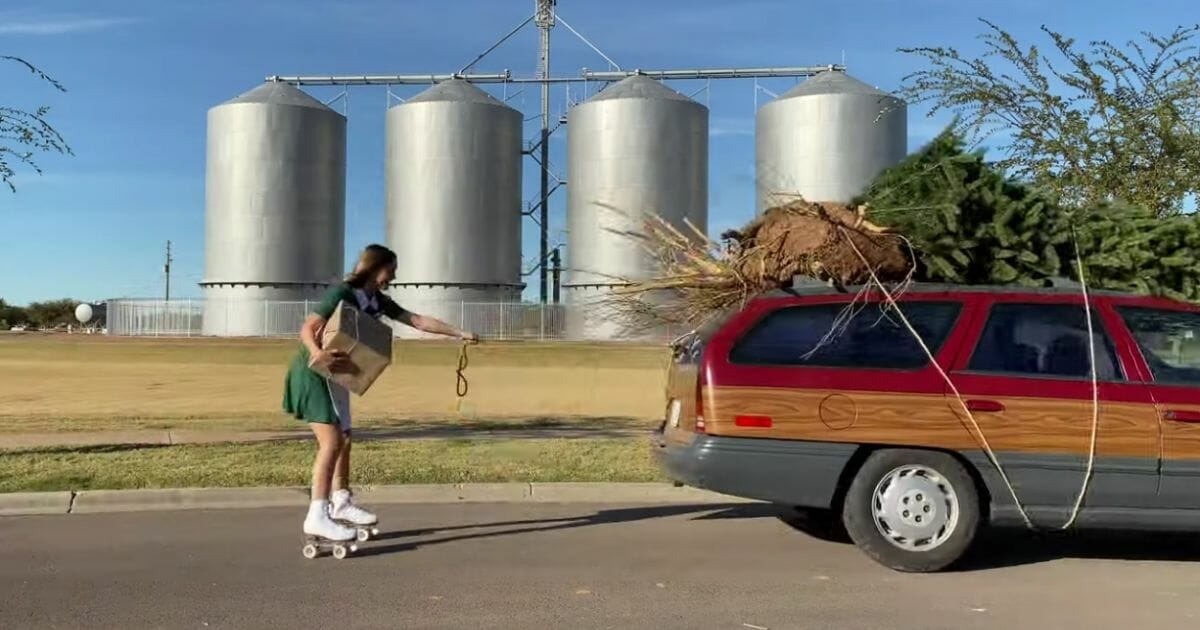 Daugher Kael roller skates behind a station wagon in the Slade family's Christmas video.
