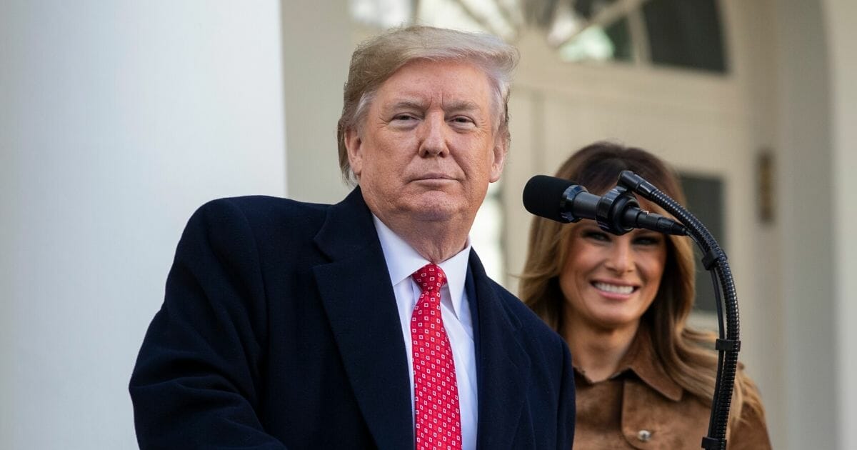 With first lady Melania Trump looking on, U.S. President Donald Trump speaks before giving the National Thanksgiving Turkey Butter a presidential pardon during the traditional event in the Rose Garden of the White House Nov. 26, 2019, in Washington, D.C.