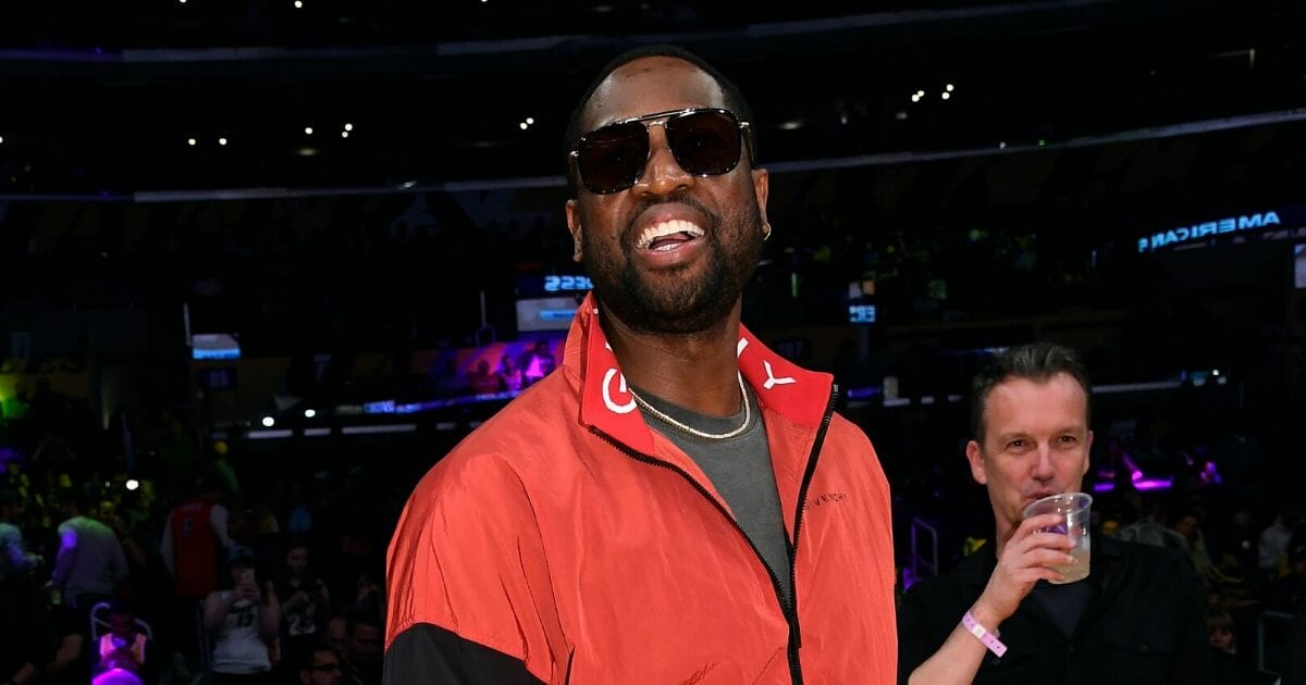 Former Miami Heat player Dwyane Wade attends a game between the Miami Heat and Los Angeles Lakers