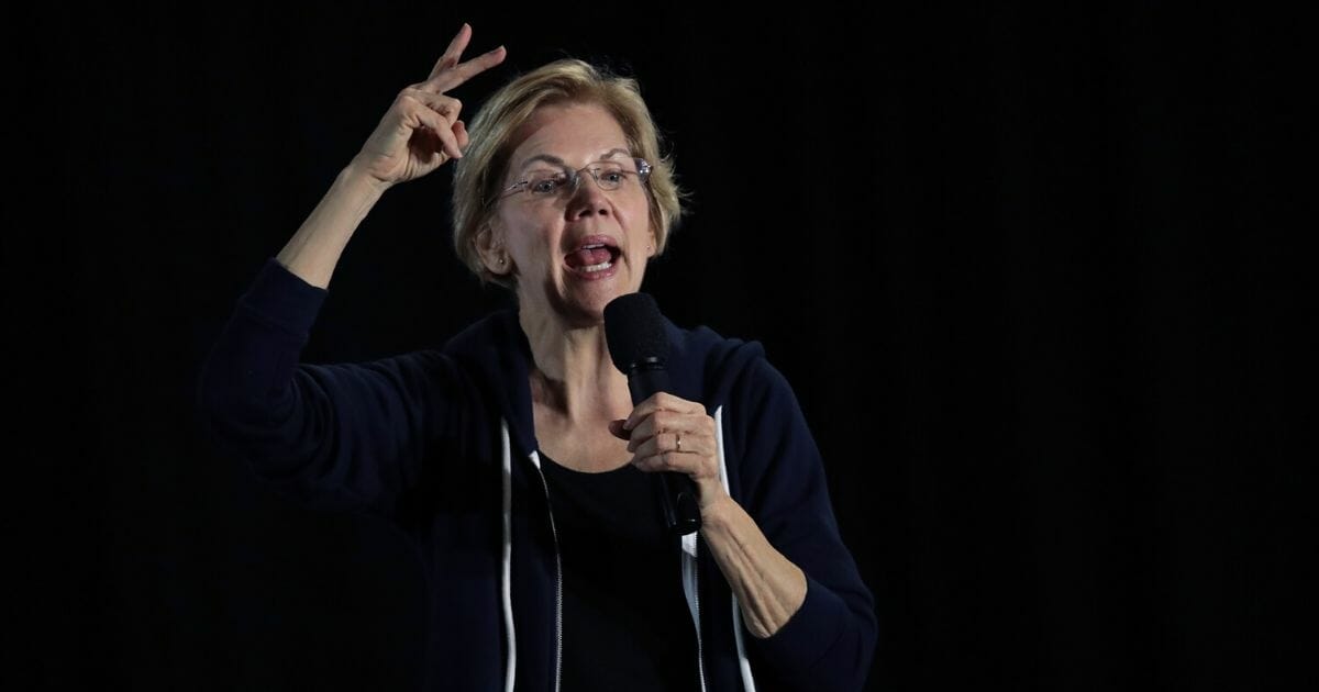 Democratic presidential candidate Sen. Elizabeth Warren (D-Massachusetts) speaks to guests during a campaign stop at the Val Air Ballroom on Nov. 25, 2019, in West Des Moines, Iowa.