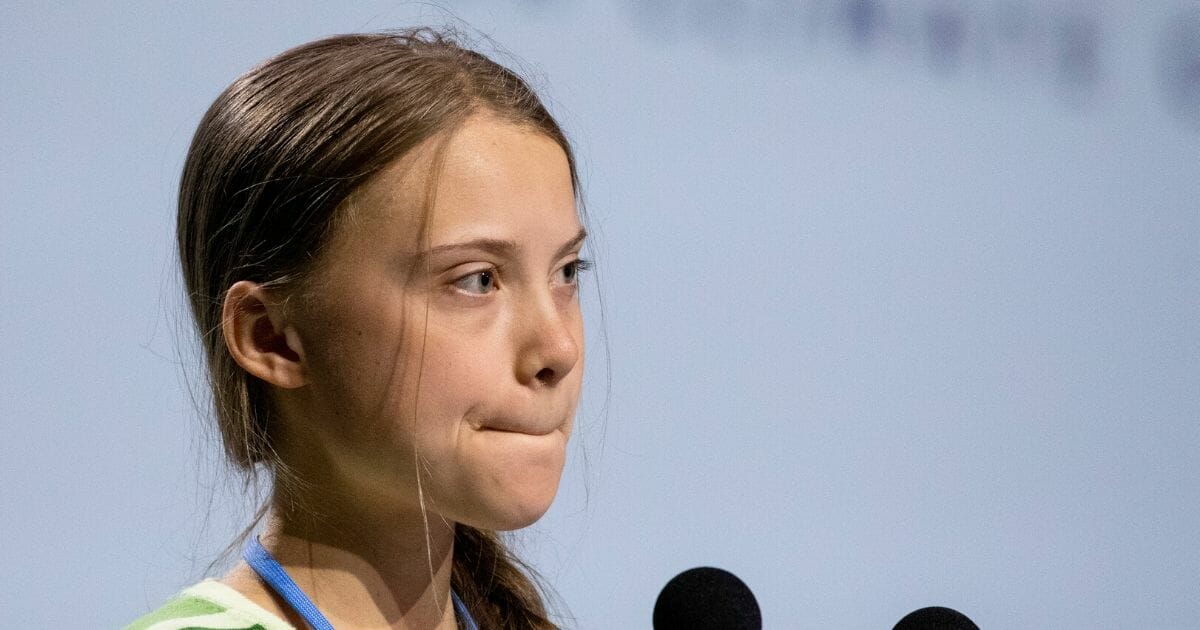 Swedish environmental activist Greta Thunberg gestures as she gives a speech at the plenary session during the COP25 Climate Conference on Dec. 11, 2019, in Madrid, Spain.