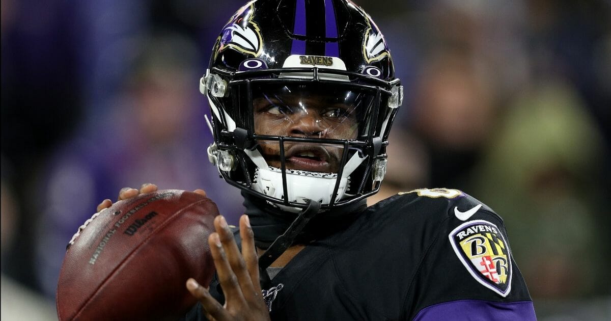 Baltimore Ravens quarterback Lamar Jackson warms up before a game against the New York Jets at M&T Bank Stadium in Baltimore on Dec. 12, 2019.