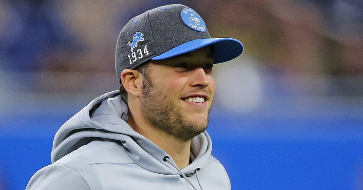 Quarterback Matthew Stafford jogs onto the field after the Lions' game against the Tampa Bay Buccaneers at Ford Field in Detroit.