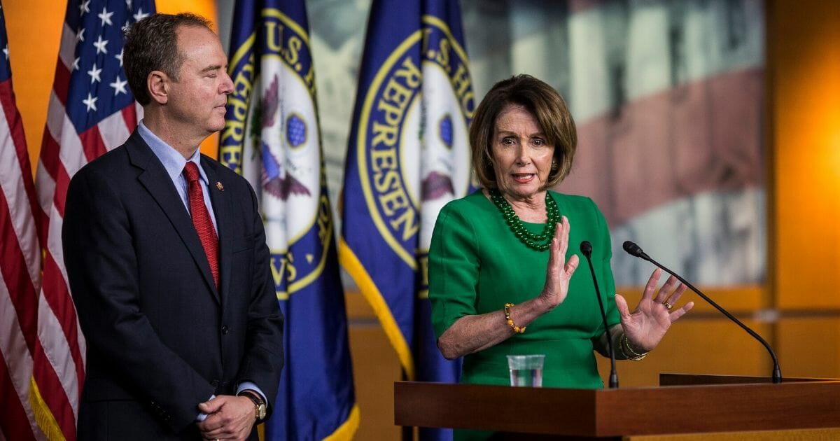 House Speaker Nancy Pelosi, right, speaks during a news conference alongside House Intelligence Committee Chairman Rep. Adam Schiff on Capitol Hill on Oct. 15, 2019, in Washington, D.C.