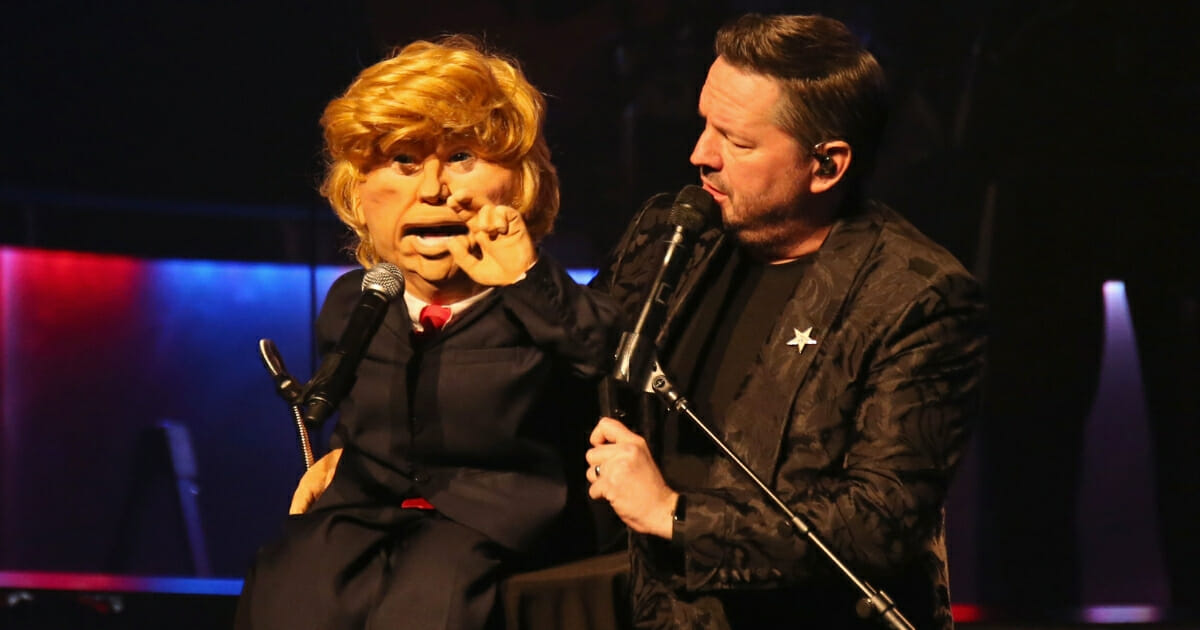 Comic ventriloquist and impressionist Terry Fator performs with his President Donald Trump puppet during his show at the Mirage Hotel & Casino in Las Vegas on March 12, 2018.