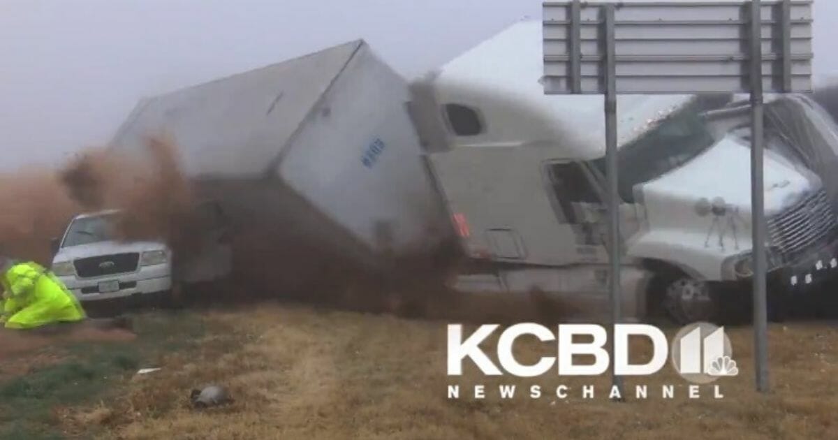 A tractor-trailer wrecks on a Texas highway.