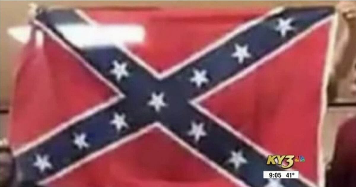 A Confederate flag raised by high school students.