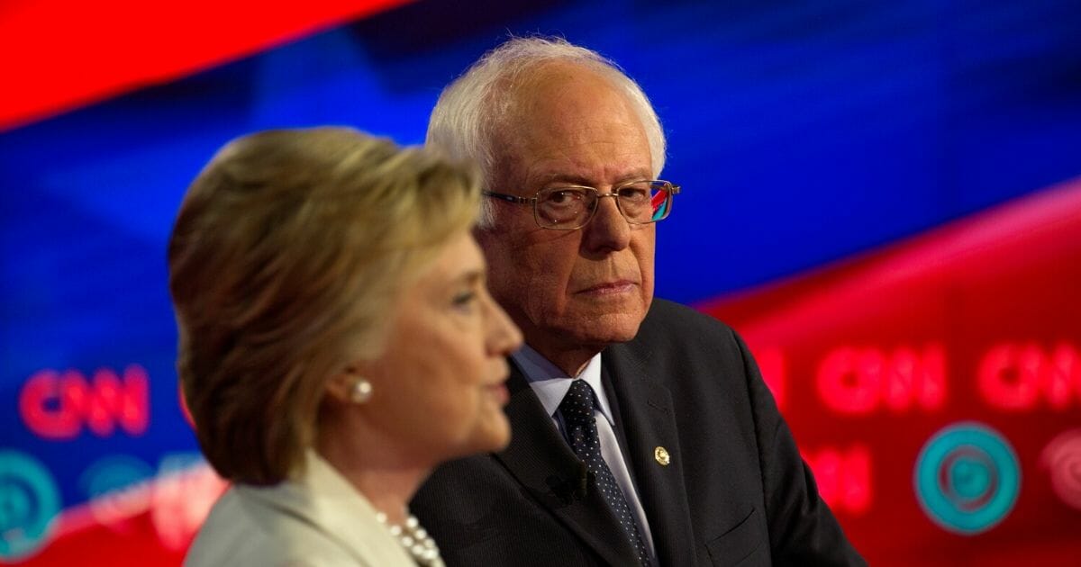 Hillary Clinton and Bernie Sanders squaring off at a 2016 debate.